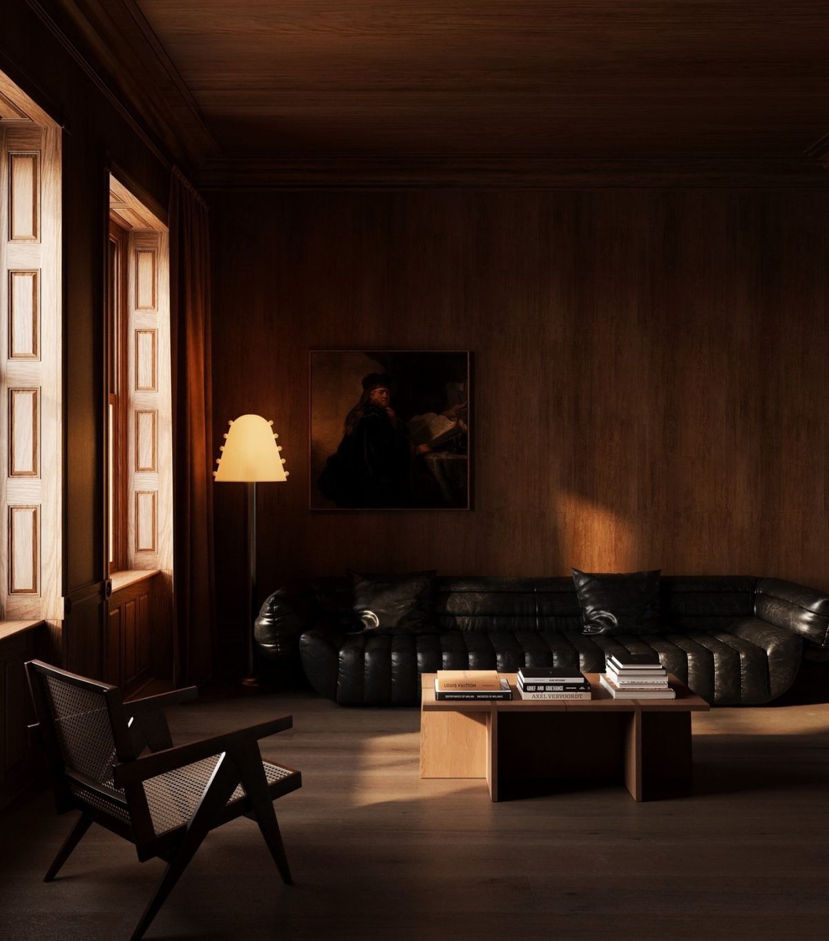 Dark timber room with a leather sofa and afternoon light through tall shutters.